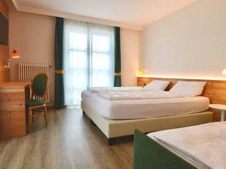 hotel alpholiday dolomiti italië trentino zuid tirol dimaro slaapkamer