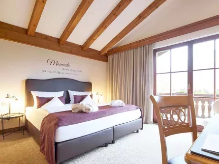 family fun brixental premium tirol brixen im thale hotel hubertus slaapkamer