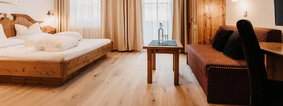 actieve gezinsvakantie outdoorvakantie families oostenrijk saalachtal unken hotel schütterbad slaapkamer